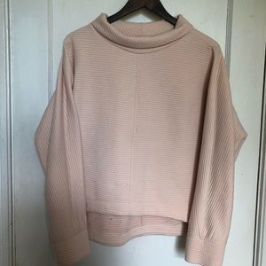 Pink cropped high neck sweater